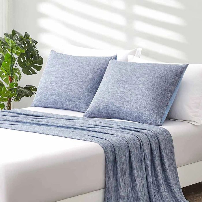Elegear Cooling Pillow Cases neatly arranged on pillows atop a bed in a bedroom