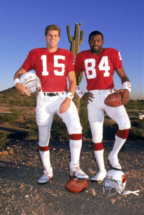 Neil Lomax, J. T. Smith