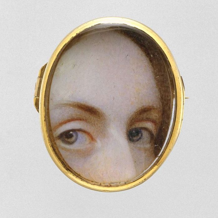 A tiny ‘lover’s eye’ locket with a delicate painting of a woman’s gaze