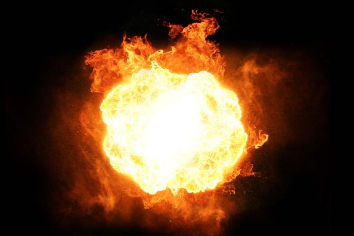 A fiery orb set against a dark backdrop