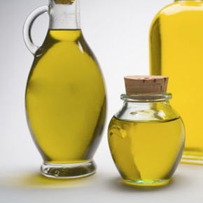 Assorted bottles of olive oil.
