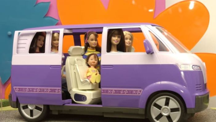 A van packed with Barbie dolls