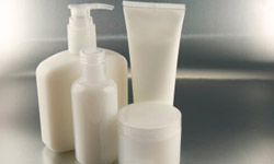 Empty lotion and cream containers.