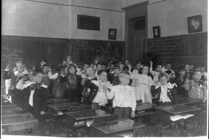 Children seated in a classroom