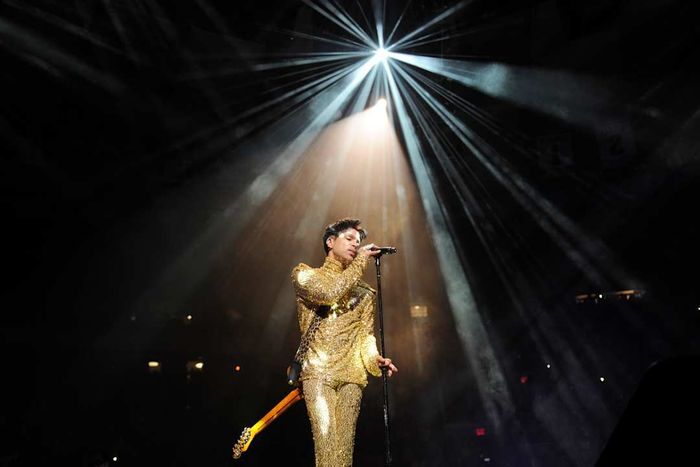 Prince takes the stage in 2011.