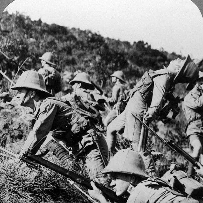 British soldiers advancing toward German positions in East Africa during World War I, 1914-1918. Artist: Realistic Travels Publishers