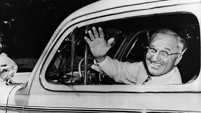 Harry S Truman pictured in a brand-new Ford car, 1945
