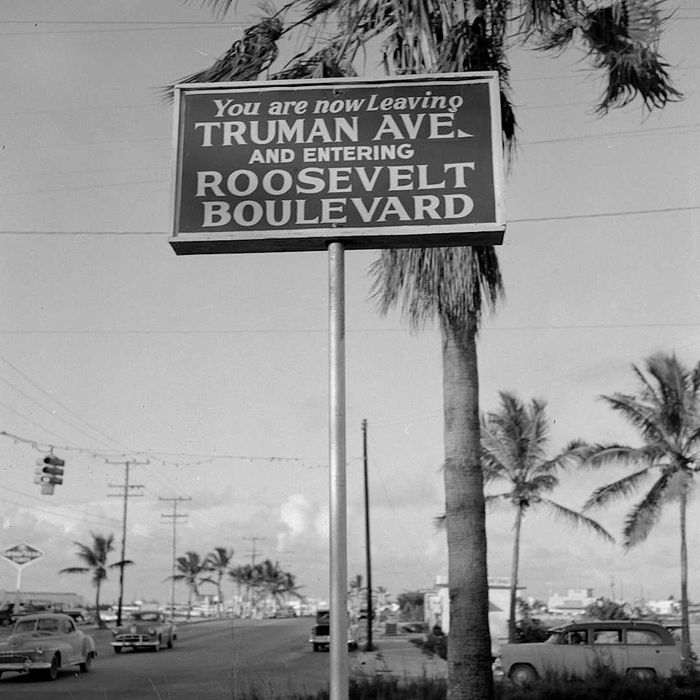A street sign in Key West, Florida, marking Truman Ave. and Roosevelt Blvd.