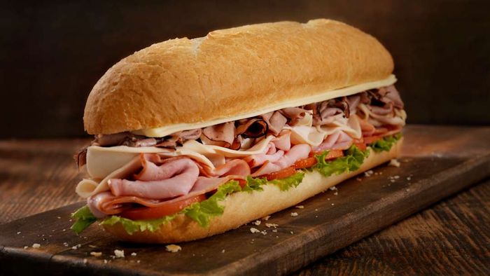 Hoagie on cutting board.