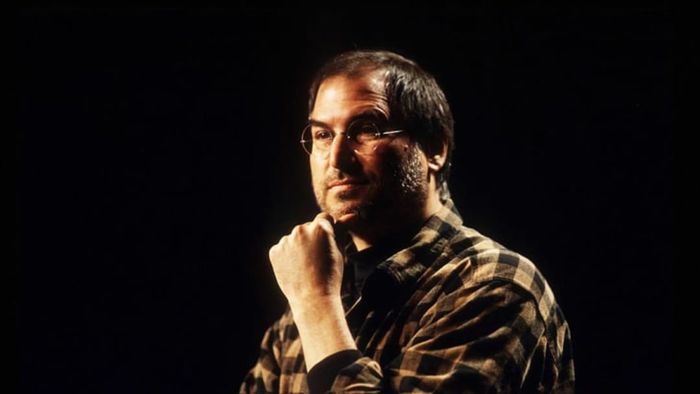 Steve Jobs delivers the keynote speech at the Cause Conference in Seattle in 1998.