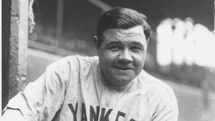 Babe Ruth strikes a pose for the camera.