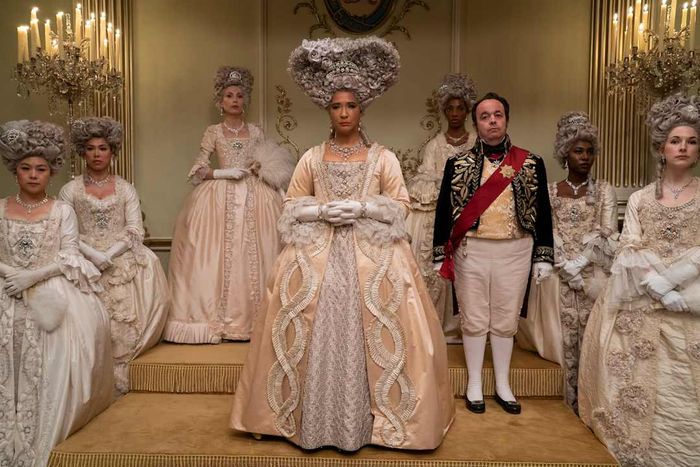 Golda Rosheuvel portrays Queen Charlotte, while Hugh Sachs plays Brimsley in 'Bridgerton.'