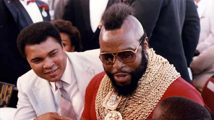 A photograph shows Muhammad Ali and Mr. T