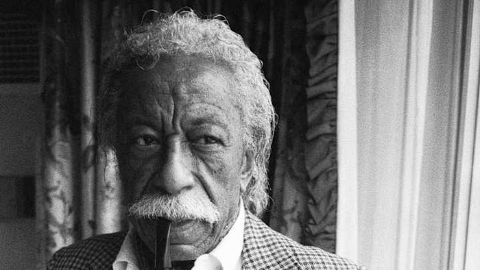 Gordon Parks Pictured with a Pipe