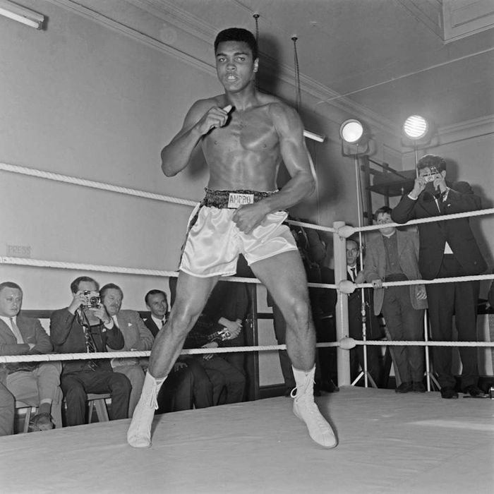 A photograph of Muhammad Ali is shown