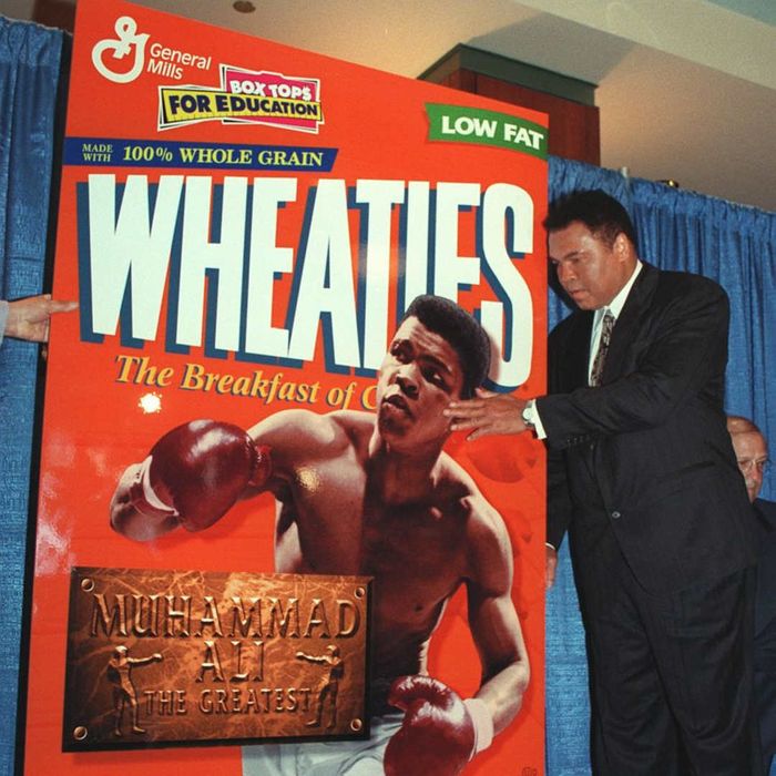 A photograph of Muhammad Ali is shown