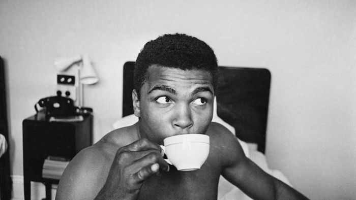 A photograph of Muhammad Ali is shown