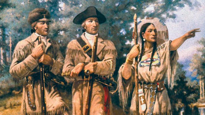 A depiction of Lewis, Clark, and Sacagawea in a historical painting.