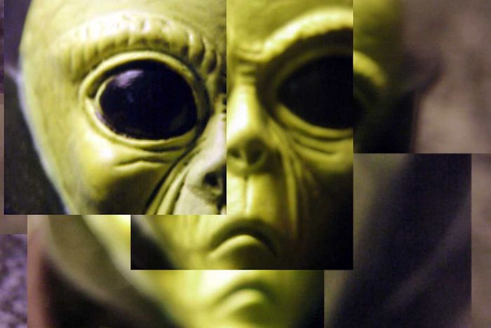 Squares overlapping to form an alien face
