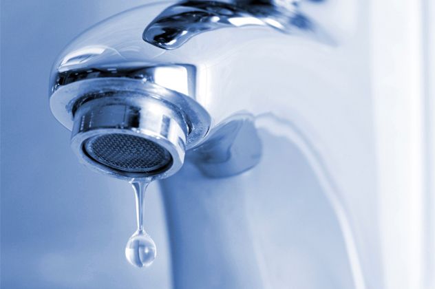 Water dripping from water faucet