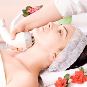 A woman undergoing an electrolysis treatment at a luxurious spa.