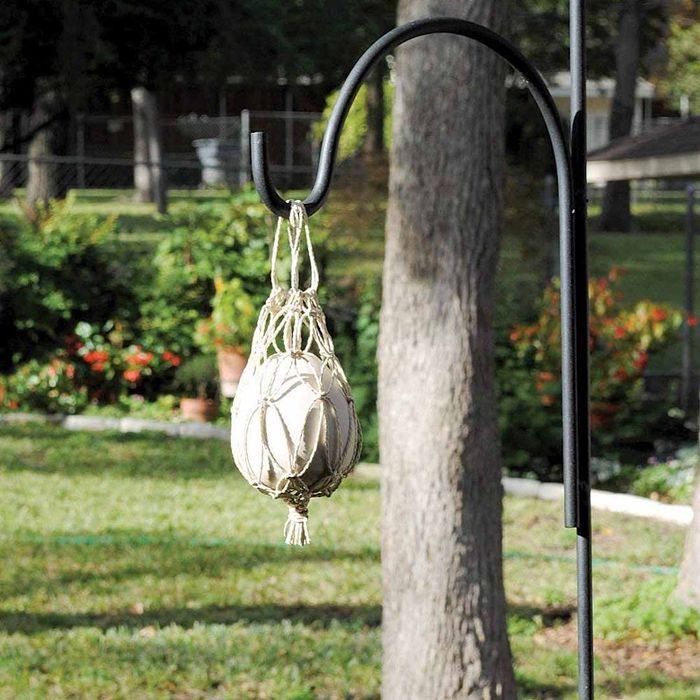 Skeeter Screen Patio Egg hanging from a pole in the yard.
