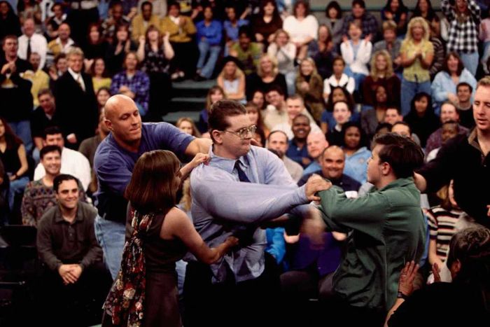 Security intervenes during a brawl on ‘Jerry Springer’