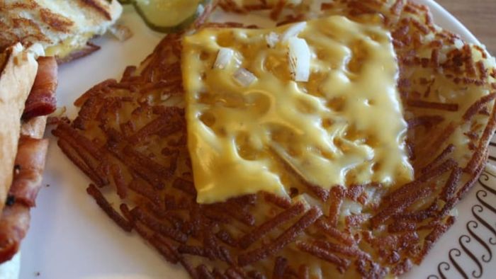 Waffle House hash browns, covered.