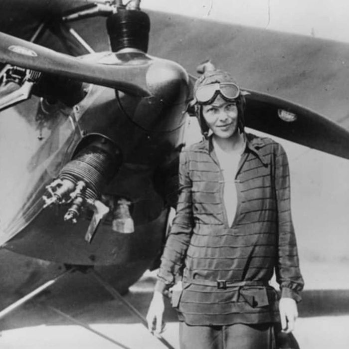 Amelia Earhart standing before her biplane ‘Friendship’ in Newfoundland.