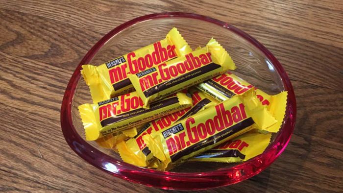 A bowl filled with Mr. Goodbar candy bars.
