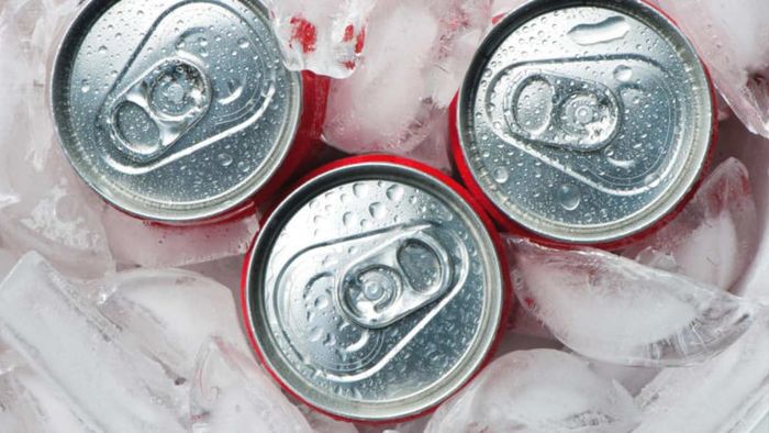 Soda cans placed on ice.