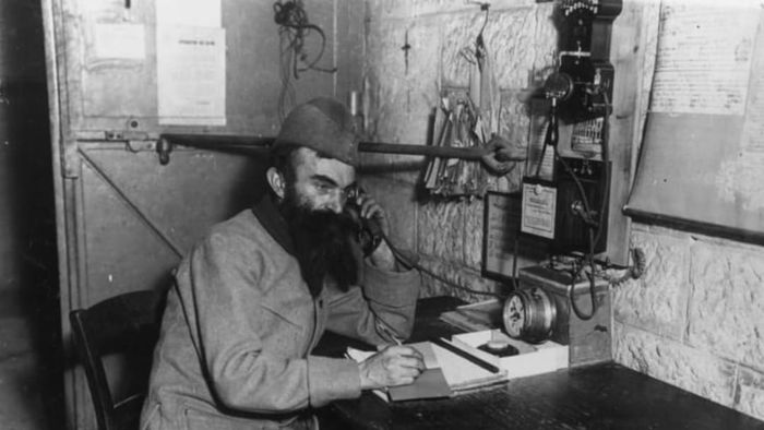 A French telegraphist at work in 1917, during World War I.