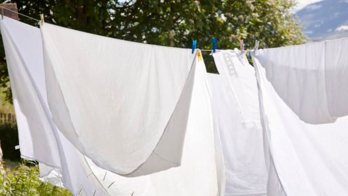 white sheets on clothesline