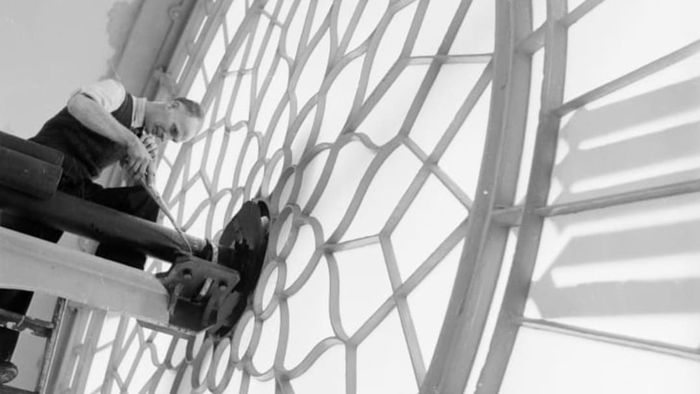 A clockkeeper maintaining London's Big Ben in 1957.