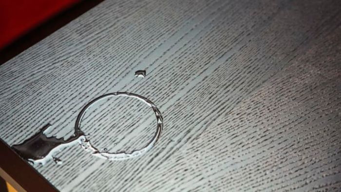 Water rings left on a wooden table.