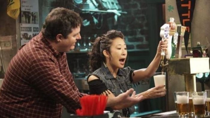 Steven W. Bailey and Sandra Oh in Grey's Anatomy.