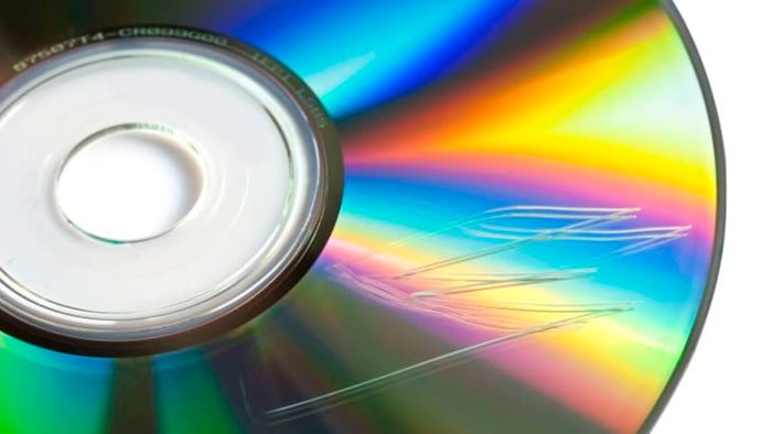 Close-up of a scratched CD.