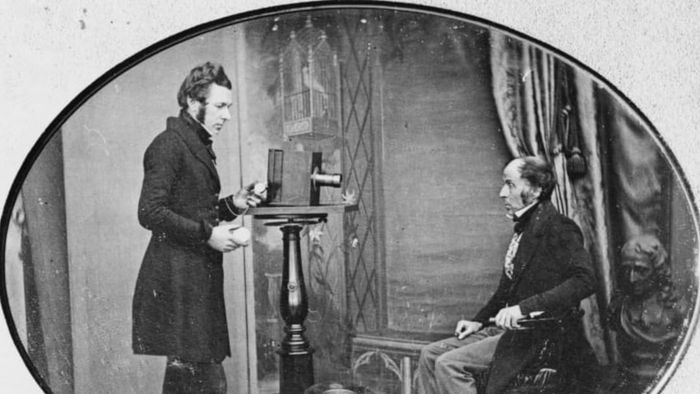 Jabcz Hogg capturing an image of W S Johnston, marking the first known photograph of a photographer in action, circa 1843.