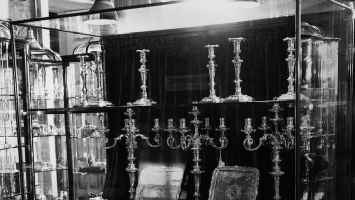 Wedding gifts from Canada, including silver candlesticks and a chest of drawers, were displayed at St James' Palace for Princess Elizabeth and Philip Mountbatten.