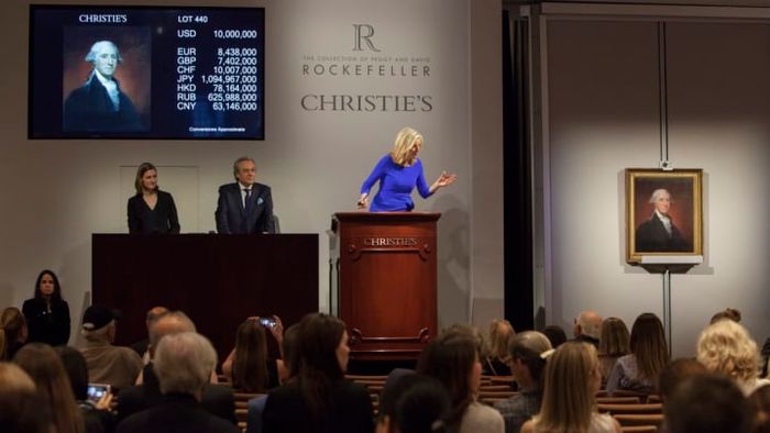 Tash Perrin, an auctioneer at Christie's, orchestrates a high-stakes sale.