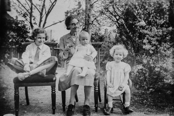 Vintage family photo of three siblings showcasing distinct birth orders