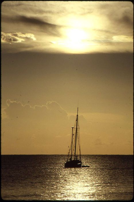 The Mimi sailing at sunset.