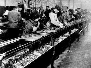 Employees working on the assembly line at Ford Motor Company in 1913.