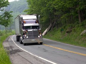 A northbound tractor-trailer on the road.