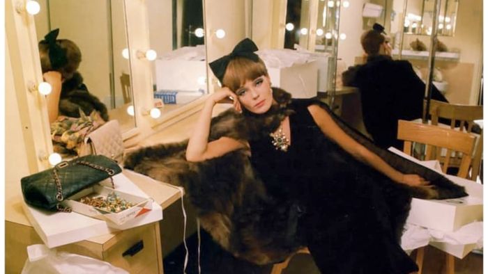 A Chanel little black dress and accessories featured in French Vogue, 1964.