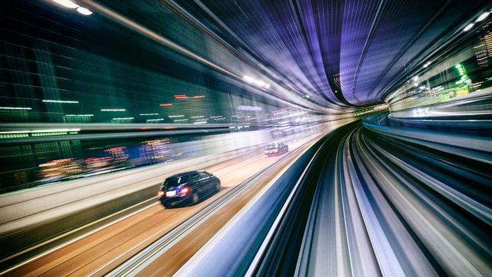 Vehicles traveling through a tunnel