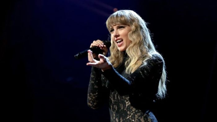 Taylor Swift takes the stage at the 36th Annual Rock & Roll Hall of Fame Induction Ceremony on October 30, 2021, in Cleveland, Ohio.