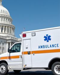 In the ambulance chain race, emergency vehicles compete while pulling cars behind them.