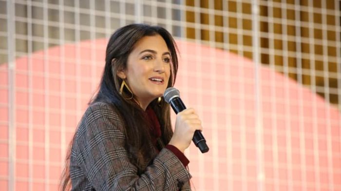 Jennifer Hyman of Rent the Runway speaking onstage at Girlboss Rally NYC 2018