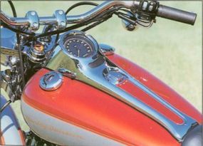 The 2000 Harley-Davidson FXSTD Deuce features a sleek chrome console that holds the speedometer.
